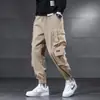Pantalones Cargo con Bolsillos de Múltiples Solapas Estilo Japonés Marca de Moda Talla Grande Pierna Ancha con Cordón Primavera y Otoño Soldadura Trabajo al Aire Libre Pantalones Casuales