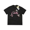 Camiseta de Manga Corta Corteiz Estilo Americano High Street al por Mayor de Fábrica para Hombres y Mujeres Rosa Estampado de Cupido Top