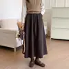 Falda midi gruesa de color gris oscuro con estampado floral para mujer, nueva colección otoño 2026, con cintura elástica, diseñada para estilizar la figura y crear un efecto adelgazante