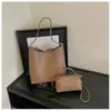 Atacado de bolsas tote novas estilo coreano, simples e retrô, com design pai e filho, grande capacidade e adequadas para uso casual, para ir ao trabalho e como bolsa de ombro ou de axila para mulheres