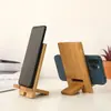 Soporte para teléfono móvil Nanzhu creativo de bambú y madera natural marco de soporte para teléfono móvil simple artefacto de drama set soporte para teléfono móvil con LOGOTIPO escolar