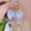 Pendientes Largos Súper Hada Dulce Pétalo Blanco Perla Borla Diseño de Nicho Elegante Estilo Festivo