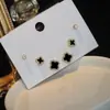 Pendientes pequeños de una semana, populares pendientes pequeños de aguja de plata S925, una tarjeta, tres pares de pendientes de combinación de traje, pendientes de circonita roja de red para mujer