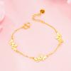Pulsera de oro de 24k de imitación mariposa versión coreana de dulces niñas Net Red vivo arena oro suministro fabricantes una generación de cabello