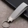 Llaveros de coche de gamuza multicolor, colgantes creativos de acero inoxidable para hombres y mujeres, pequeños regalos, llaveros de coche con cordones