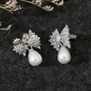 Brincos de Tarraxa Vazados com Laço Inlaid de Pérola Falsa e Zircônia Estilo Romântico Francês Luochen Brincos Criativos com Franjas Ornamentos para Orelha