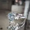 Anillo de cobre con flor incrustada de circonio blanco Huajie moda joyería transfronteriza anillo de temperamento网红