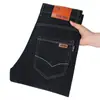 Nuevos jeans de mezclilla elástica para hombre, corte recto holgado, ropa casual para hombre talla grande, pantalones de trabajo duraderos y resistentes a la suciedad