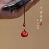 Explosiones en vivo cinnabar nube auspiciosa candado de la suerte colgante este año nube auspiciosa colgante arena roja bajo contenido regalo venta al por mayor