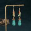 Airyuan Tendencia Nacional Joyería Retro Esmalte Nicho Aguja de Plata 925 Flor de Magnolia Imitación Jade Hetian Aretes Estilo Antiguo
