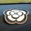 Agita la red de sonido Joyería para coche de网红 Coche diamante pluma almohadilla almohadilla de silicona para coche Perla flor de té almohadilla fabricantes una generación de pelo