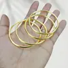 Venta en vivo pulsera de aleación pulsera chapada en oro pulsera con patrón de hierba rodante pulsera de semilla de loto dosel de loto joyería