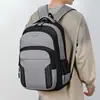Mochila de negocios de comercio exterior al por mayor para hombres y mujeres, bolsa para computadora casual de gran capacidad, mochila de viaje para estudiantes elegante y simple
