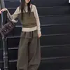 Conjunto de dos piezas estilo coreano para niñas con tirantes falsos y manga larga, atuendo de otoño súper elegante, nuevo modelo 2026 para niños mayores.