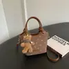 Cross2026 Otoño Invierno Nuevo Estilo Coreano Estilo Perezoso Bolso Cubo Bolso de Mano Corazón Elegante Moda Bolso de Hombro Cruzado Individual