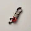 Directo de fábrica llavero de cuerda tejida accesorios de ferretería hebilla de herradura colgante para llave de coche accesorios de coche de moda