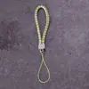 Lanyard para teléfono móvil al por mayor de fábrica, cordón para llavero de cámara de cuero PU, cuerda de muñeca para teléfono móvil de pareja, cuerda tejida de cuero