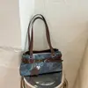 Bolso de axila retro estilo chica caliente Shuai Mi Jia para mujer, nuevo bolso de mano para el día a día 2026, bolso baguette, bolso de hombro texturizado