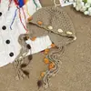 Nuevo Estilo Sombrero de Lana Tejido Estilo Étnico para Mujeres en Otoño e Invierno Cálido Colorido Bola de Pelo Borla Protección para Orejas Sombrero de Punto