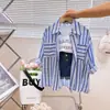 Conjunto Transfronterizo para Niñas 2026 Moda Infantil Estilo Coreano Camisa de Manga Larga a Rayas + Chaleco Pantalones Conjunto de Tres Piezas