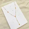 Colar com Pingente em Y de Camélia Dourada Micro-Incrustada com Zircônia, Estilo Europeu e Americano Transfronteiriço, Acessório de Pescoço Gentil e de Design Único para Mulheres