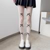 Medias de red negras sexys populares de Internet JK delgadas con lazo rasgado para primavera y verano, calcetines japoneses de base hueca oscura de moda
