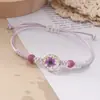 Flores secas, flores preservadas, pulseira de flor de pessegueiro e gipsofila, flores em cordão de cera bicolor colorido de vidro, joias para transmissão ao vivo transfronteiriça atacado