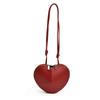 Bolso de diseño de nicho de moda para mujer, nuevo estilo 2024, popular bolso bandolera combinable, mini bolso en forma de corazón, bolso de color liso para debajo del brazo.