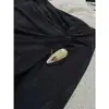 [Destacado] Yuran 26 Nueva Colección de Principios de Otoño: Conjunto de punto con hombro asimétrico y manga larga, mezcla de acetato, con falda midi de abertura lateral