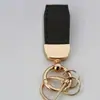 Marca de moda patrón de cordero llavero corto llavero cabeza de rábano llavero de regalo pequeño llavero de cuero charm simple para bolso
