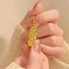 Nuevo estilo "Riqueza de Todas Partes" collar de barra de oro pequeño para mujer, nuevo estilo chino, elegante, lujo ligero, alta gama, cadena vintage para la clavícula, estilo chino