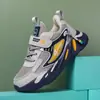 Zapatos para niños al por mayor zapatos deportivos temporada de primavera y otoño temporada escolar zapatos para correr niños medianos y grandes malla cuero zapatos casuales antideslizantes resistentes al desgaste