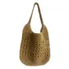 Bolso de paja de un solo hombro floral hueco tejido a mano, nuevo bolso tote tejido de gran capacidad, bolso de playa para vacaciones, bolso versátil para mujer
