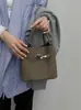 Bolso Cubo Texturizado Estilo Coreano Principios de Otoño para Mujer 2025 Nuevo Popular Bolso de Mano Elegante Estilo Extranjero Versátil para Viajar y Uso Diario Bolso Cruzado