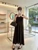 Vestido Tricô Camisola Design Francês de Luxo Feminino Outono Inicial 2026 Novo Estilo Cor Sólida Versátil Saia Evasê com Franjas