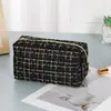 Bolsa de cosméticos de moda de alto valor con envoltorio de hilo dorado, nueva 2023, gran capacidad, bolso de mano portátil, bolsa de almacenamiento para cosméticos