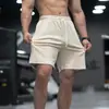 GYM ARM Marca de Moda Pantalones Cortos para Hombre Verano Nuevos Shorts Deportivos de Fitness Casuales Combinan con Todo Pantalones de Ante