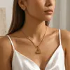 Set de Joyería de Moda Transfronteriza Europea y Americana para Mujer, Gama Alta, Personalizado, Pendientes Exagerados Geométricos de Corazón de Amor, Collar con Colgante para Mujer