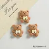 Color té de leche Mika oso de café resina accesorios pequeños hechos a mano DIY agujero de refrigerador hebilla de zapato accesorios para el cabello