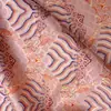Jacquard de patrón de ondas rosa seda tela de alta gama tela de seda de alta densidad tela para cojín de sofá de palo de rosa Qipao