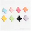 Accesorios de resina de color sólido brillante con forma de estrella de cuatro puntas, materiales DIY de pegamento cremoso para fundas de teléfono, imanes de nevera y accesorios para el cabello