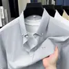 Camisa masculina de manga curta da moda 100% algodão bordada, camisa versátil de cor sólida para o verão, respirável, de alta qualidade, camisa masculina de botão