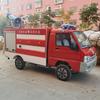 Camión de bomberos eléctrico pequeño de tres ruedas equipo asiento de una fila camión de bomberos de batería camión de bomberos eléctrico máquina al por mayor