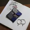 Muestra de pedido final se puede pedir bolsa de tela de brocado para regalo bolsa Wenwan estilo japonés bolsa de almacenamiento de joyas billetera plegable tela
