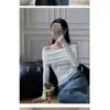 Novedad Otoño e Invierno Tejido de Punto Rayado Holgado Manga Larga Top Interior Cremallera Cuello Polo Suéter Pulóver Corto para Mujer
