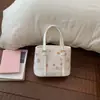 Bolsa de Mão Estilo Cesta Tendência para Mulheres Primavera/Verão 2026 Nova Moda Coreana Bolsa Tote Casual Bolsa de Ombro Transversal Estilosa