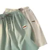 Shorts de Seda de Gelo para Mulheres Verão 2023 novo estilo coreano para estudantes calças cropped soltas versáteis calças de perna larga da moda ins para mulheres