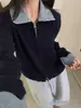 Cardigan de Tricô Patchwork em Jeans Estilo Europeu Falso Duas Peças para Mulheres, Novo Casaco Suéter com Zíper Duplo e Gola Reversível Outono e Inverno 2025