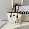 Bolso tote grande de color block nuevo y elegante 2026 para mujer, moderno para la escuela, el trabajo y el uso diario, bolso de hombro, bolso de axila, transfronterizo