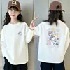 Camiseta Versátil de Algodão Puro com Manga Longa para Meninas 2026 Nova Coleção Primavera e Outono Estilo Coreano Camiseta Básica Casual para Meninas Mais Velhas